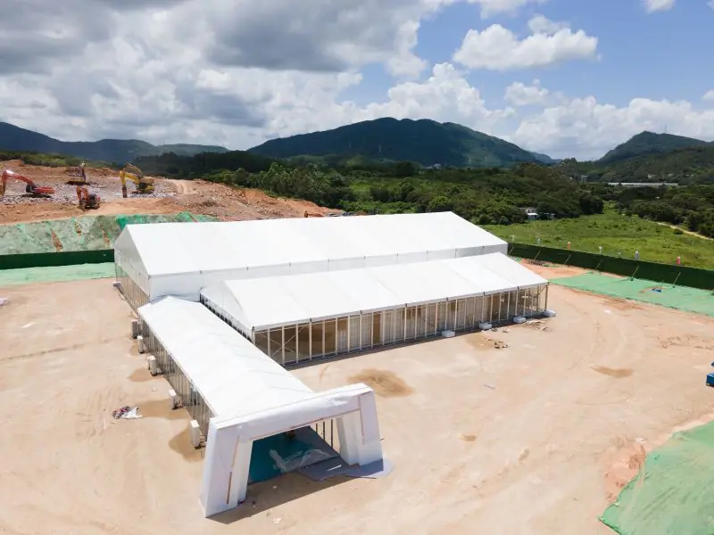 Wide-angle drone shot of 20x50m Canton Fair Tent in full operation