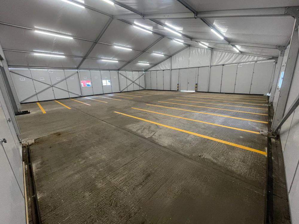 Interior of 15x15m UK Workshop Tent with clearspan workspace setup